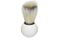 a picture of a shaving brush on white background
